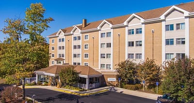 Exterior view of Tall Oaks Assisted Living facility