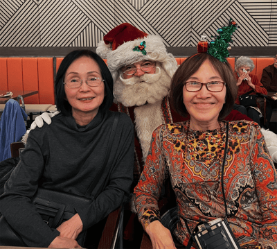 Residents celebrating with Santa in a festive setting