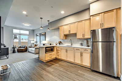 Bright kitchen area with modern appliances and decor
