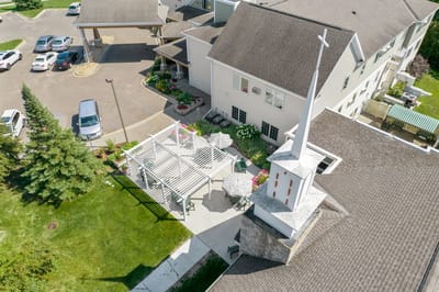 Aerial view of outdoor space with seating and gardens