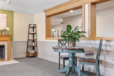 Common area with a round table and green plant