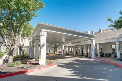 Entrance area with covered portico at Ridgmar Place
