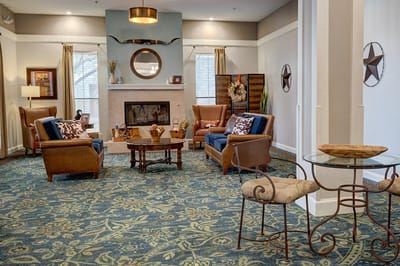 Interior view of a cozy common area with seating