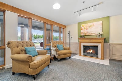 Cozy common area with seating and fireplace