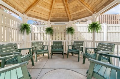 Outdoor gazebo with seating around a circular space