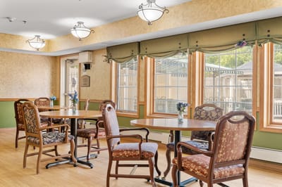 Interior of a common area with tables and chairs