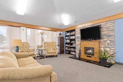 Cozy common area with comfortable seating and a TV