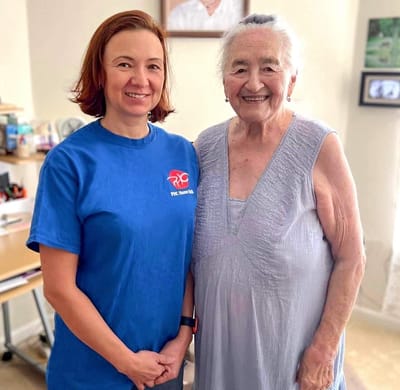 Staff member with resident in the facility