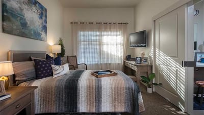 Cozy resident room with bed and decor