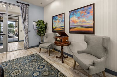 Cozy lounge area with artwork and seating
