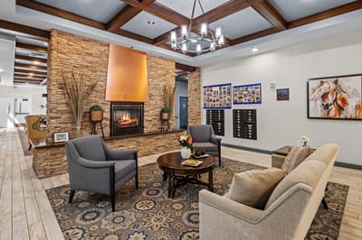 Comfortable lounge area with a fireplace and seating
