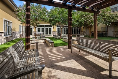 A tranquil outdoor space with benches and trees