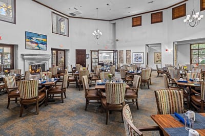 Bright and spacious dining area with tables and chairs