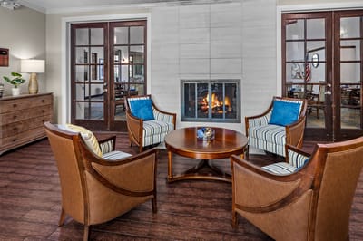 Warm and inviting common area with a fireplace