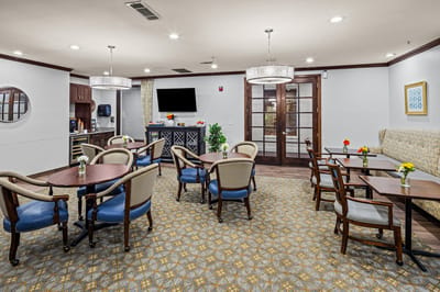 Dining room with tables and chairs in a cozy setting
