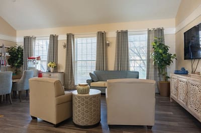 Bright common area with seating and plants