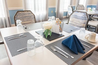 Dining table set for a meal in the dining room
