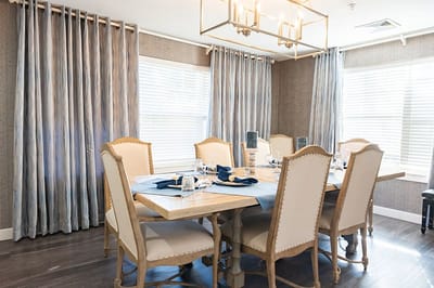 Elegant dining room setup with wooden table and chairs
