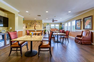 Interior view of a common area with tables and chairs