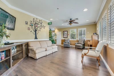 Common area with seating and decorative wall art