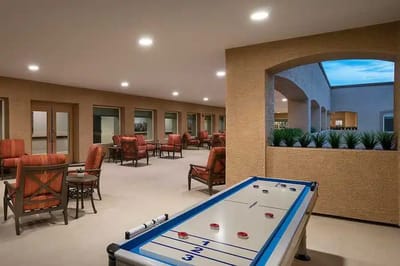 Common area with seating and air hockey table