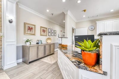 Bright interior reception area with decor and plants