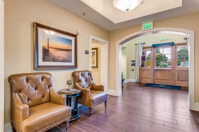 Welcoming lobby area with seating and artwork