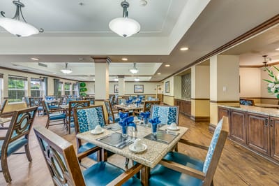 Modern dining room setup with blue decor