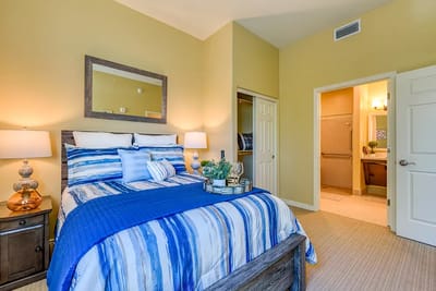 Brightly furnished bedroom in a senior living facility