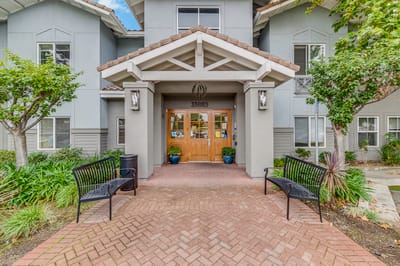 Entrance of the Pacifica Senior Living facility with landscaping