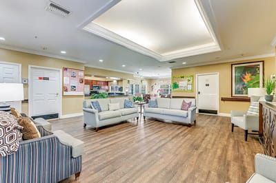 Bright common area with seating and decor