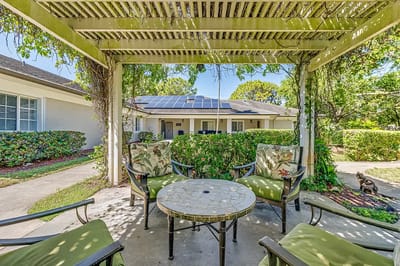 Outdoor seating area with a shaded pergola