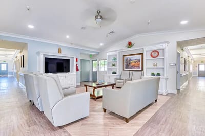 Bright common area with comfortable seating and decor