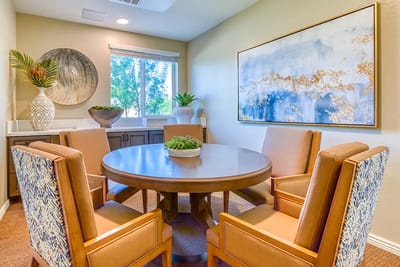 Bright and welcoming common area with a circular table