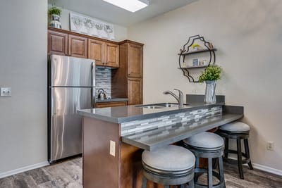 Bright common area kitchen with modern appliances