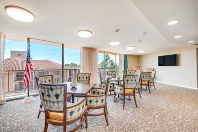 Bright common area with seating and natural light