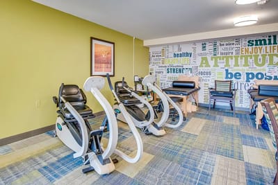 Fitness equipment in a bright activity room