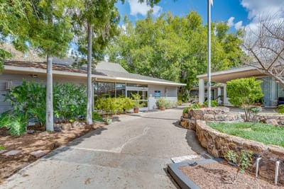 Exterior view of Monte Vista Village with gardens