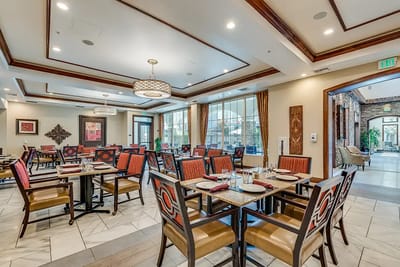 Elegant dining area with tables and chairs