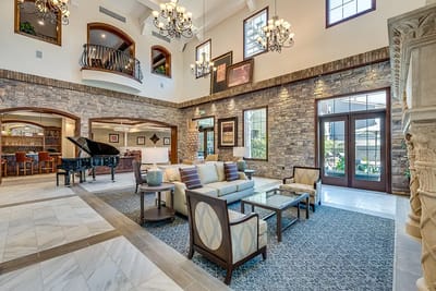 Interior common area with seating and piano