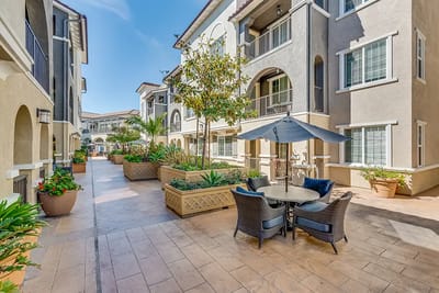 Outdoor courtyard with seating and landscaping