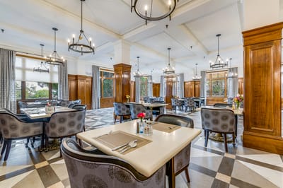 Elegant dining room with stylish decor and seating