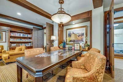 Common area with seating and bookshelves