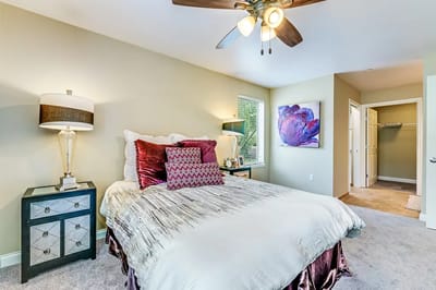Cozy bedroom with floral decor and soft lighting