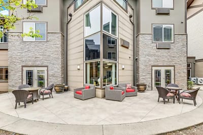 Exterior view of the facility's outdoor space with seating