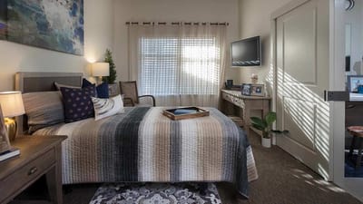 Cozy resident room with a bed and furnishings