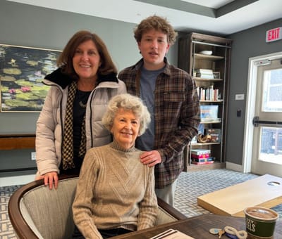 Residents with family in a common area
