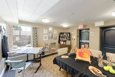 Art room with creative supplies and paintings