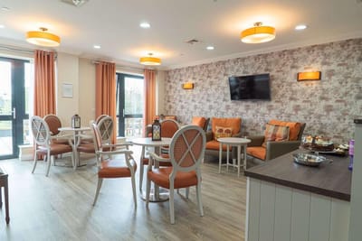 Bright common area with seating and decor
