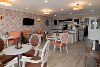 Bright common area with seating and decor